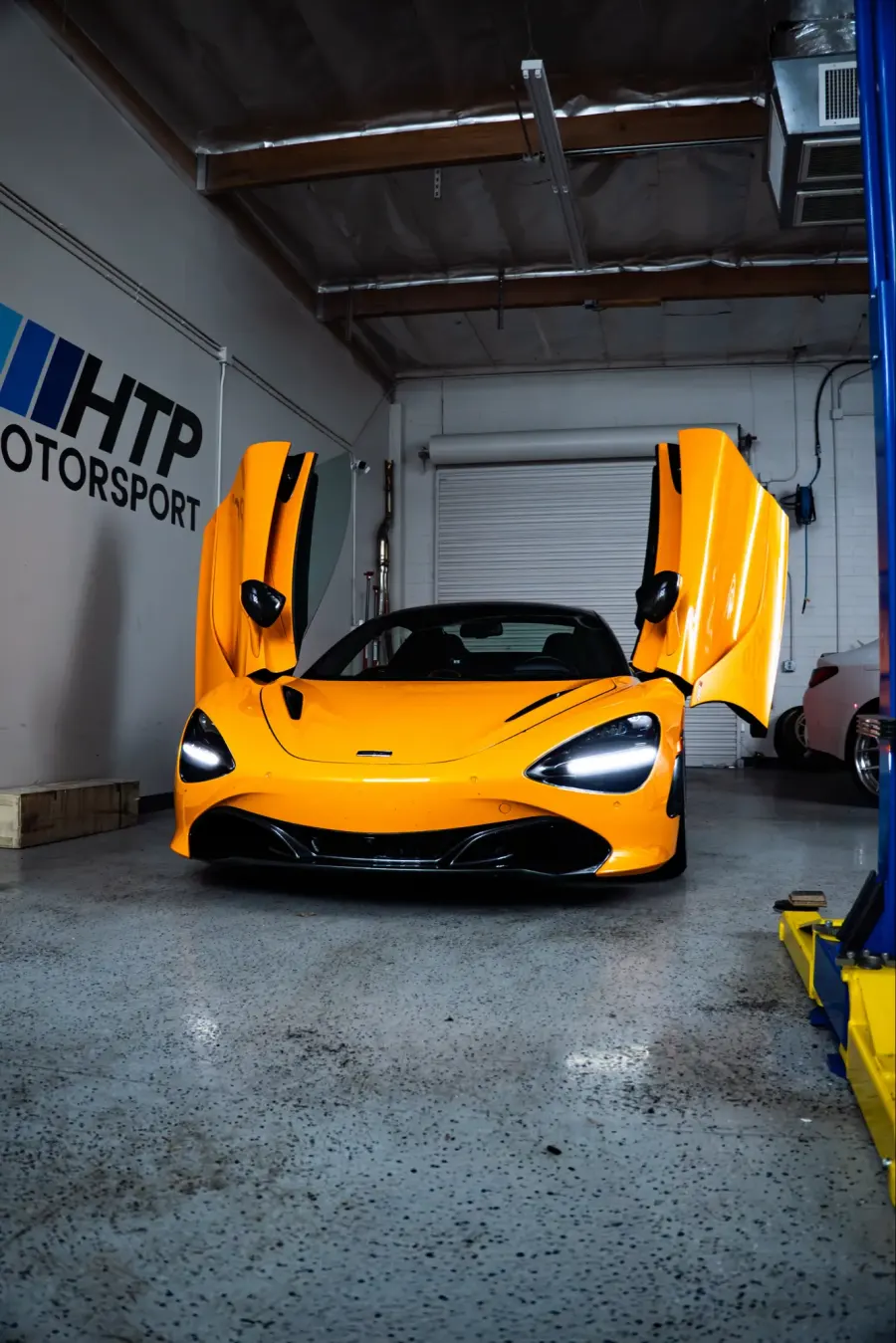 McLaren 720S with its doors up in the HTP shop